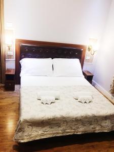 Postel nebo postele na pokoji v ubytování Hotel Aida