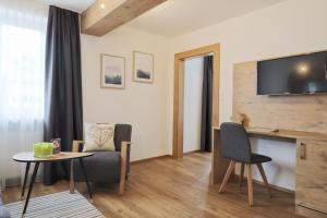 TV a/nebo společenská místnost v ubytování Seelos - Alpine Easy Stay - Bed & Breakfast