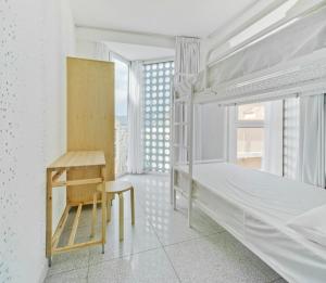 Postel nebo postele na pokoji v ubytování Loop INN Hostel Cartagena