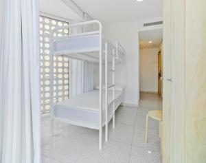 Postel nebo postele na pokoji v ubytování Loop INN Hostel Cartagena