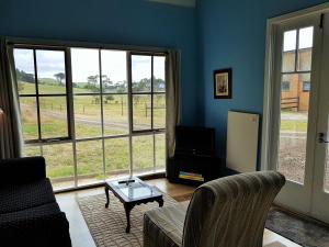 Coragulac House Cottages的休息区