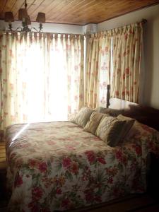 מיטה או מיטות בחדר ב-Unique Lodge