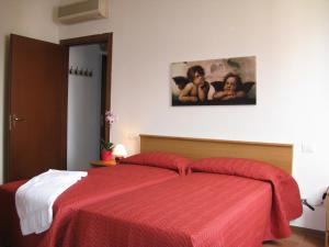 
Letto o letti in una camera di Mio Hotel Firenze
