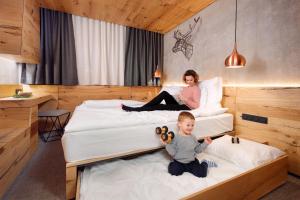 Krevet ili kreveti u jedinici u okviru objekta Rogla – Hotel Rogla