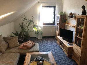 Ferienhaus und Ferienwohnung Eichhornにあるシーティングエリア