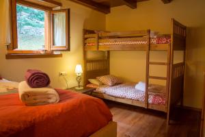 Posteľ alebo postele v izbe v ubytovaní Apartamento Antecada