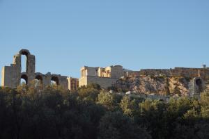 a castle on top of a hill with trees at ★ Plaka, Center of all Greek Legends ★ in Athens