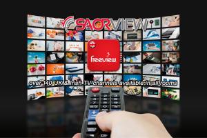 TV a/nebo společenská místnost v ubytování Inishross House