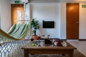 TV a/nebo společenská místnost v ubytování Poblado Guest House