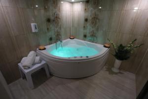 Vannituba majutusasutuses Garni Hotel Laguna Lux
