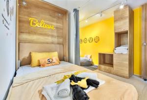 Postel nebo postele na pokoji v ubytování hipstercity hostel