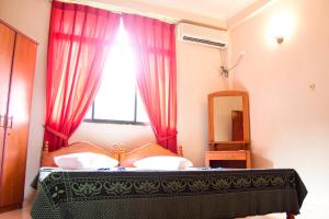 Postel nebo postele na pokoji v ubytování Kandy View Hotel + 23 fotografií
