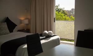 Katil atau katil-katil dalam bilik di Herston Place Motel