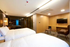 TV a/nebo společenská místnost v ubytování Hotel tt Seomyeon