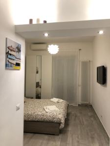 Postel nebo postele na pokoji v ubytování Maison Lidia