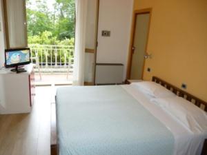 En eller flere senge i et værelse på Hotel Sole & Esperia