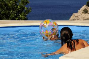 Bazén v ubytovaní Paradis Apartments alebo v jeho blízkosti