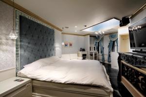 מיטה או מיטות בחדר ב-Hotel ValentineTogo (Adult Only)