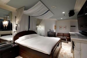 Katil atau katil-katil dalam bilik di Hotel ValentineTogo (Adult Only)
