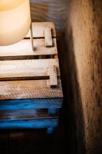 two wooden stairs with a lamp on them at Eko Chata Sweet Home in Ustroń