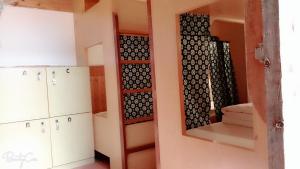 Postelja oz. postelje v sobi nastanitve Matsu 1st Hostel