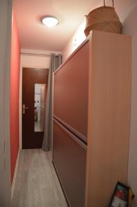 a sliding door in a room with a hallway at C208 Studio Cabine avec Terrasse proche Plage in Arcachon