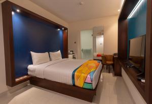 Voodi või voodid majutusasutuse Grand Picasso Hotel toas