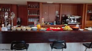 a kitchen with a counter with food on it at Hostal Rural La Montería in Orcera