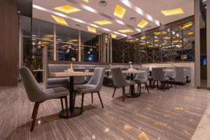 Restoran või mõni muu söögikoht majutusasutuses Grand Picasso Hotel