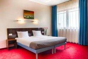 
Łóżko lub łóżka w pokoju w obiekcie Focus Hotel Gdańsk
