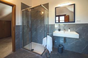 a bathroom with a shower and a sink at Il Giardino di Venere in Mondello