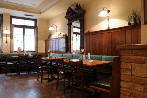 Reštaurácia alebo iné gastronomické zariadenie v ubytovaní Hotel & Restaurant Graf