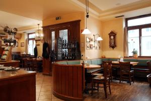 Posedenie v ubytovaní Hotel & Restaurant Graf