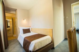 a bedroom with a bed in a room at Hotel Soleluna in Piano di Sorrento