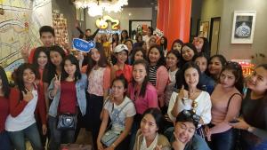 a group of people posing for a picture at Norn Yaowarat Hotel in Bangkok