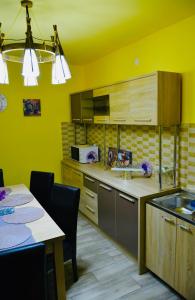 Kuchyň nebo kuchyňský kout v ubytování Casa Iris Center