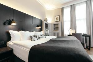 Postelja oz. postelje v sobi nastanitve Apótek Hotel Reykjavík by Keahotels