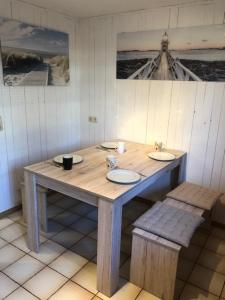 a wooden table with two sinks in a room at Monteurzimmer Rodenbach in Rodenbach