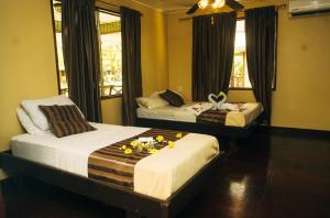 Cama o camas de una habitación en Overbridge River Resort