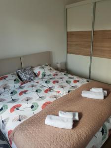 เตียงในห้องที่ Lion Apartment Zagreb