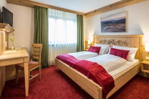 Postel nebo postele na pokoji v ubytování Hotel - Landgasthof Rebstock + 37 fotografií