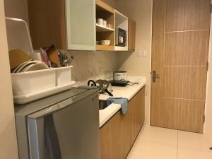 مطبخ أو مطبخ صغير في Creys condo at Pico de Loro Cove