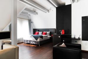 Ένα ή περισσότερα κρεβάτια σε δωμάτιο στο niXe Boutiquehotel & Spa