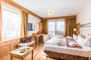 Postel nebo postele na pokoji v ubytování Hotel DreiSonnen