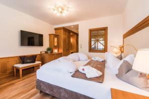 Postel nebo postele na pokoji v ubytování Hotel DreiSonnen