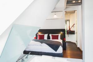 Postel nebo postele na pokoji v ubytování niXe Boutiquehotel & Spa