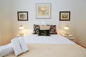 A bed or beds in a room at Del Parque Flats - Premium - Maestre
