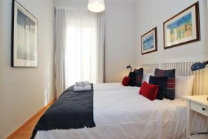 A bed or beds in a room at Del Parque Flats - Premium - Maestre