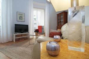 A television and/or entertainment centre at Del Parque Flats - Premium - Maestre