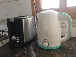 Kemudahan buat kopi dan teh di Apartamentos Irigoyen